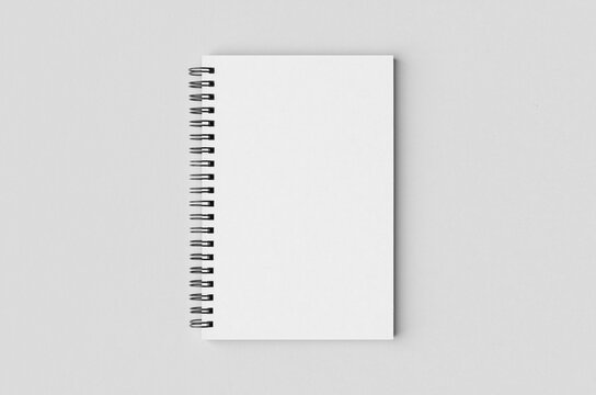 White spiral notebook mockup.