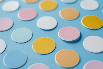 pastel colored round stickers on a blue background mockup