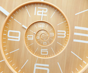 Infinity and other time related concepts. Wooden clock face twisted in spiral, fractal pattern
