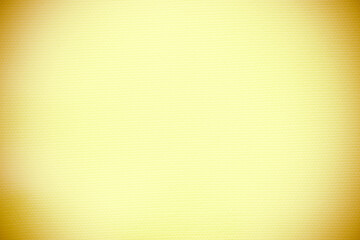 Yellow canvas fabric background texture. Brown yellow fabric abstract background with copy space...