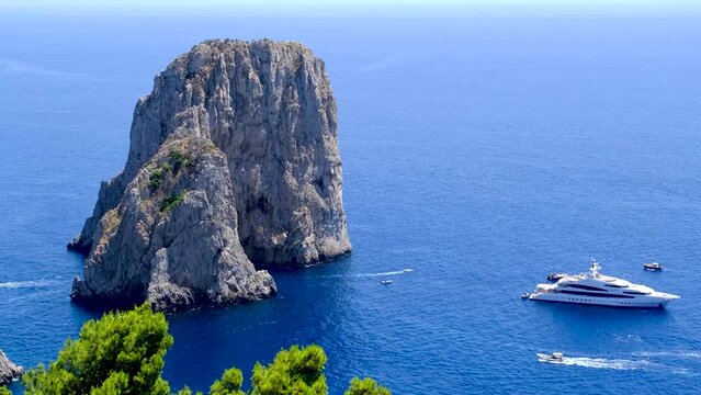 Luxury yacht by Faraglioni di Capri.