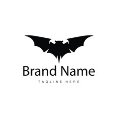Obraz premium Simple black silhouette design bat logo illustration of a nighttime animal with a minimalist concept