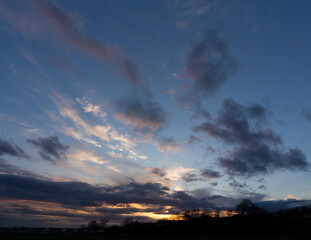 Tragic gloomy sky over the city. Panorama. Storm clouds cover the landscape. Tragic gloomy sky.