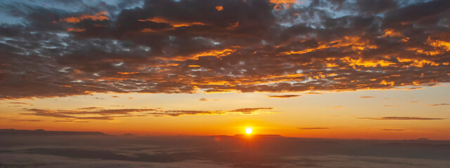 Banner Golden sky sunrise dramatic beautiful landscape view. Dawn sky gold dusk time cloudscape with sunlight. Panorama Dramatic sunset scenic landscape. Beautiful landscape nature with copy space