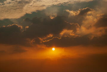 Golden sky sunrise dramatic beautiful landscape view. Dawn sky gold dusk time cloudscape with...