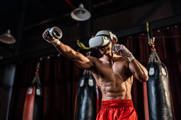 Asian sportsman using innovative technology VR glasses for exercise. 