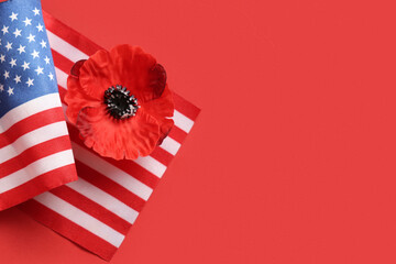 Flag of USA and poppy flower on red background. Memorial Day celebration