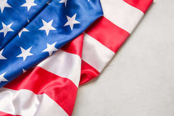 Naklejka premium USA flag on light background, closeup. Memorial Day celebration