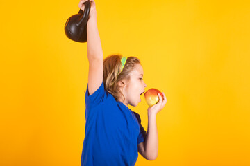 Kids sports exercises. Healthy kids life and sport concept. Portrait of child boy working out with dumbbells. Motivation and sport concept for children.