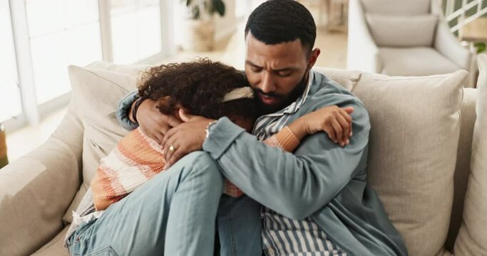 Father, crying daughter and comfort with hug, care and support for love, bonding and help in family home. Dad, sad girl and empathy with chat to deal with emotions, fear and anxiety in house