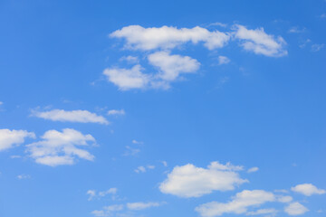 The sky is blue and clear with a few clouds scattered throughout