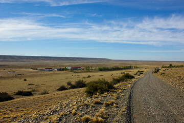 Typical Patagonian Ranch Houses with Vibrant Roof Colors Standing Out in the Rugged Natural Landsca