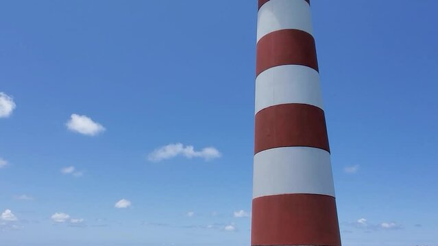 Tower lighthouse close up in cayo de agua island, tilt down from top until botom