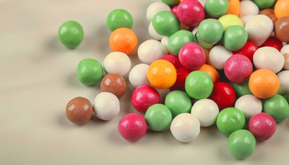 Obraz premium Brightly colored gum balls laying flat, background