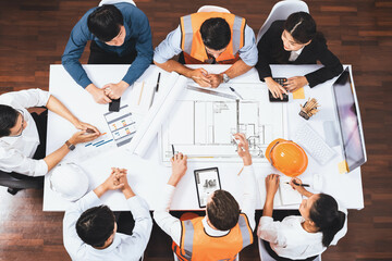 Top view banner of diverse group of civil engineer and client working together on architectural...