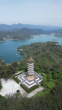 Aerial view of Pa Cien Pagoda with Ita thao pier background in Nantou