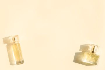Perfume bottle on beige background, Glass bottle of perfumery