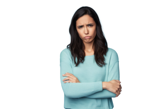 Upset young woman with crossed arms, frowning, light transparent background