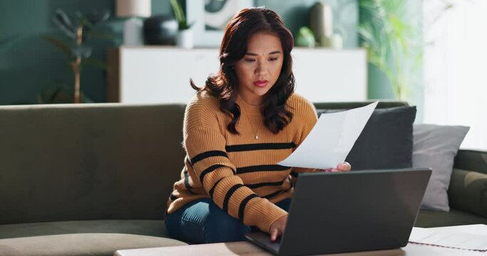 Typing, paper and woman on couch with laptop for internet, online spreadsheet and planning household budget. Computer, document or accountant girl on sofa for remote work with bills or loan statement