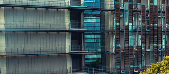 Closeup of skyscraper facade abstract urban background pattern