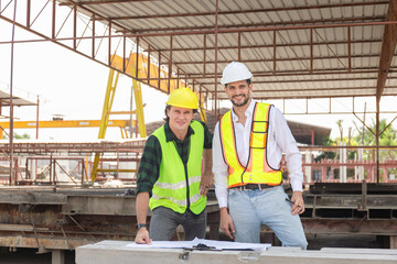 Engineer and foreman worker team checking project at precast concrete factory site, Engineer and...