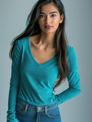 beautiful model posing in the long sleeve t shirt and jeans