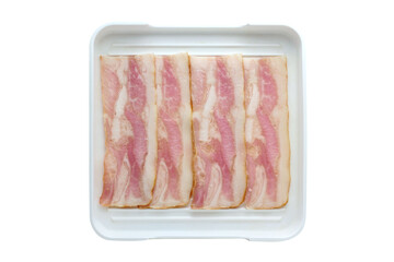 Top view of raw smoked bacon placed in a white tray isolated on white background.