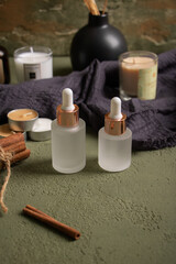 multiple white pipette bottles for cosmetic or spa with decoration 
