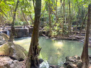 Waterfall on a river in the tropical forest of Thailand