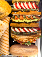 Hamburgers on a counter in a market