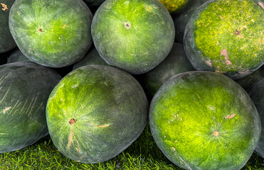 Watermelons on the counter in the market