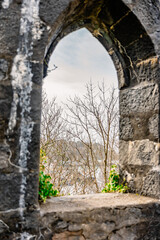 Obraz premium View Through A Stone Ruin Window
