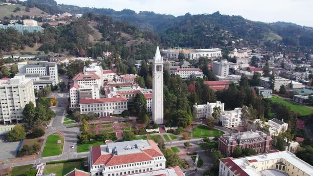 Aerial View of The Campanile Tower, Central Landmark of University of California Berkeley Campus, Drone Shot
