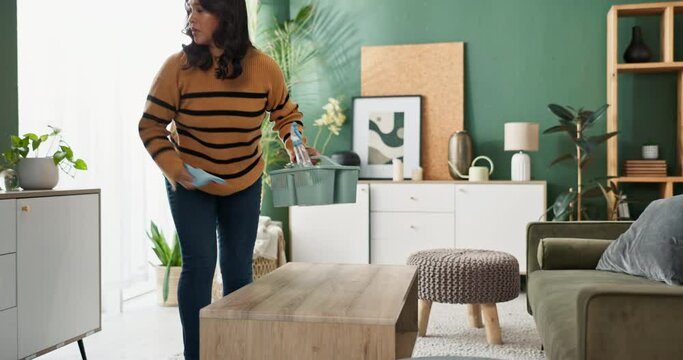 Woman, housekeeper and cleaning with timelapse for hygiene or domestic service in living room at home. Female person, maid or cleaner wiping surfaces and furniture for tidy house or dirt removal