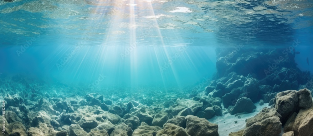 Poster Underwater rocks create an abstract water texture in this image providing ample copy space