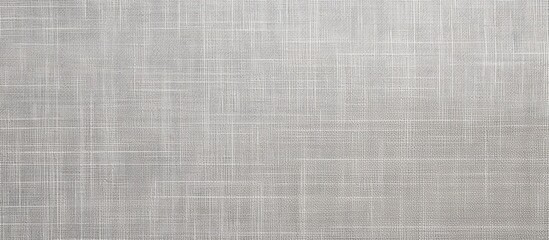 A detailed shot capturing the texture of a gray canvas with a white background providing ample space for text or images