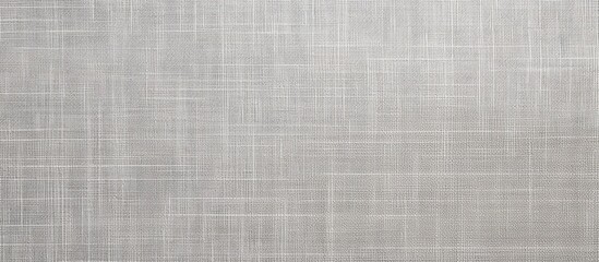 Fototapeta premium A detailed shot capturing the texture of a gray canvas with a white background providing ample space for text or images