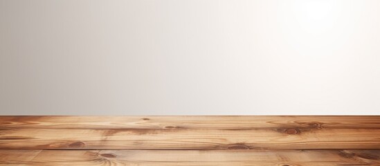 Fototapeta premium A brown wooden tabletop is situated on a white background with plenty of space for images. Creative banner. Copyspace image
