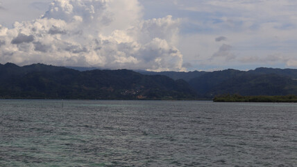 View of a seaside island in Indonesia taken in the afternoon. beautiful scenery
