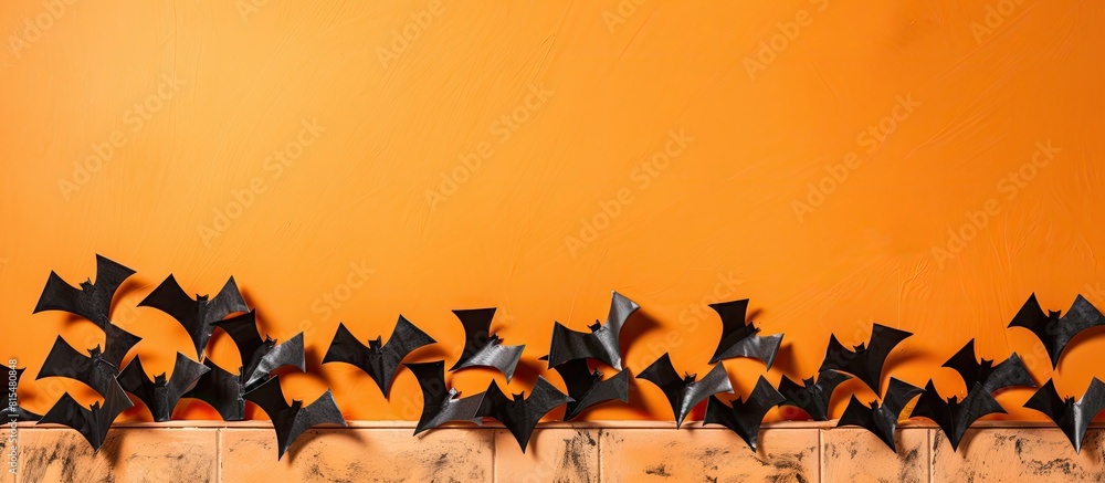 Poster from above there is a view of a bulletin board decorated with spooky wooden blocks and paper bat mic