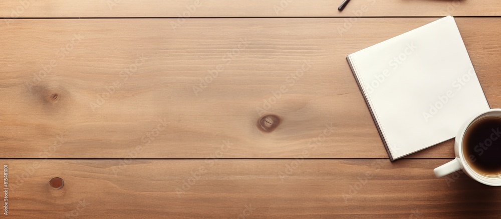Poster A bird s eye view of a pristine office desk featuring a sleek smartphone a notebook a steaming coffee cup and a keyboard Ample copy space provided for your text