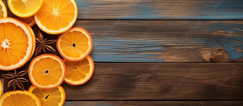 Leinwandbilder top view of orange chips and dried orange slices arranged on a wooden background the horizontal copy