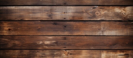 Obraz premium The vintage wooden backdrop features an aged natural texture that adds character and charm Perfect for showcasing your copy space image