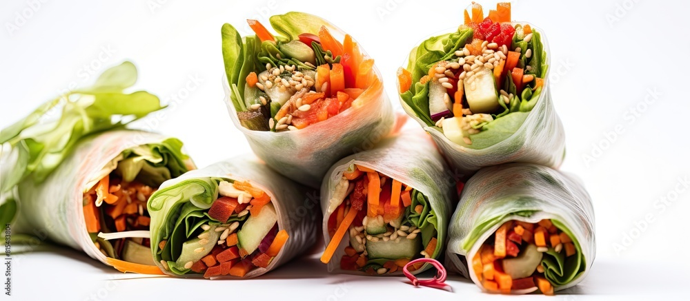 Poster a copy space image of healthy vegetable spring rolls with sesame seeds presented on a clean white ba