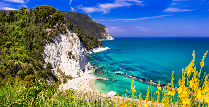 Italy summer holidays, best scenic sea landscape and beaches of Riviera del Conero- natural park near Ancona. View of picturesque beach Spiaggia del Frate