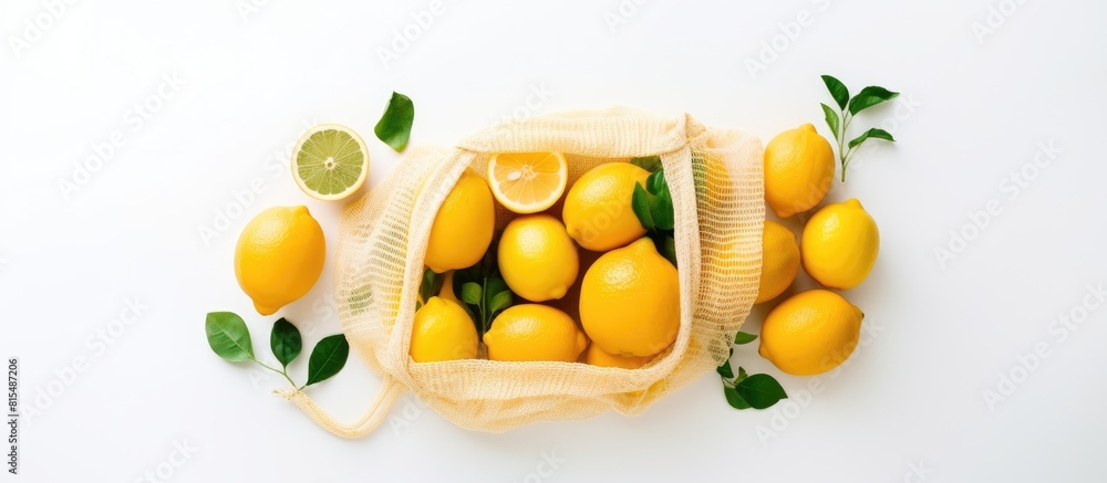 Poster Flat lay copy space image showcasing the zero waste concept with a variety of eco friendly bags including string mesh and grocery bags A lemon sits on a white background adding a fresh touch Top view