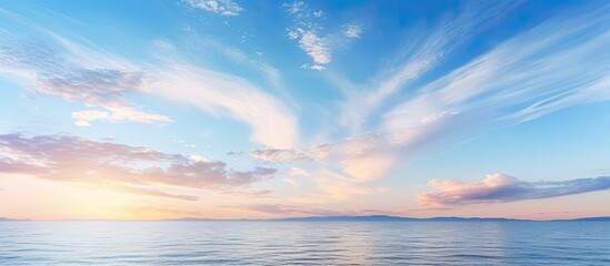 Obraz premium A stunning morning scene with a magnificent sky vibrant sea and a sunny day offering a picturesque horizon Copy space image