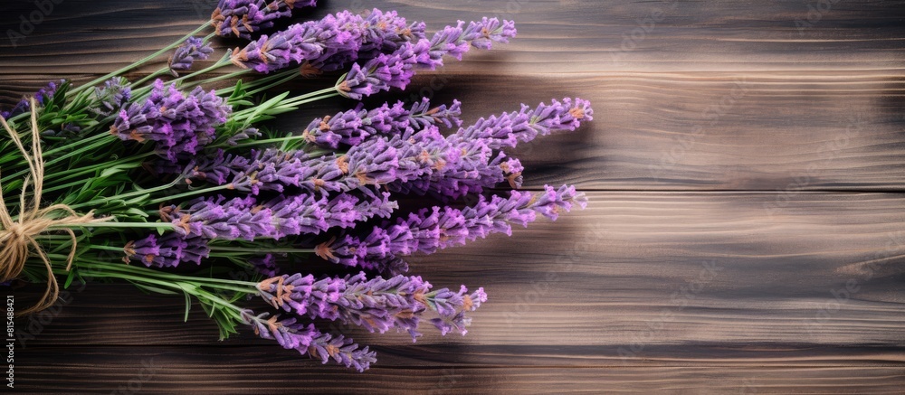 Poster a top down view of fresh lavender bouquet with wood as the background creates a captivating copy spa