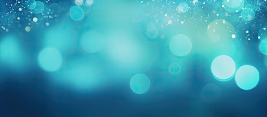 Fototapeta premium Glowing teal background with abstract blue bokeh perfect for a holiday concept Copy space image for a banner