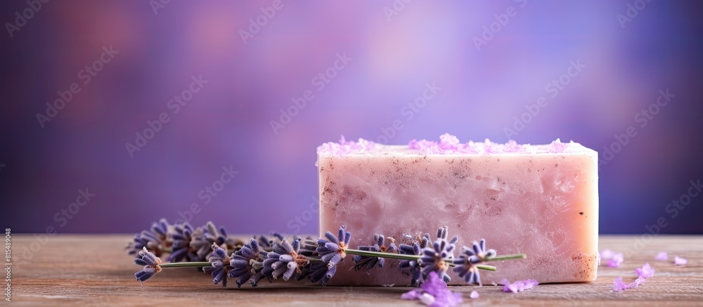 Poster The image displays a lavender scented organic soap bar resting on a background of violet color The handmade soap highlights the concept of spa products and skincare while leaving empty space for text